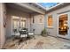Inviting outdoor patio with tiled flooring and a cozy seating area, great for enjoying the outdoors in style at 18500 N 95Th St, Scottsdale, AZ 85255