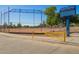 Exterior shot of the Frontier Elementary baseball field, under a bright sunny sky at 21181 N 80Th Ln, Peoria, AZ 85382