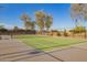 Community tennis court with well-maintained surface for recreational play and friendly matches at 21181 N 80Th Ln, Peoria, AZ 85382