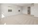 Spacious bedroom with plush carpet, abundant natural light, and ensuite bathroom access at 22660 E Pegasus Pkwy, Queen Creek, AZ 85142
