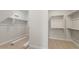A walk-in closet with ample shelving and storage space at 22660 E Pegasus Pkwy, Queen Creek, AZ 85142