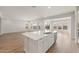 Spacious open concept kitchen with a central island, stainless steel appliances, and natural light at 22660 E Pegasus Pkwy, Queen Creek, AZ 85142