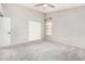 Bedroom with closet, soft carpet, neutral walls, and bright natural lighting at 2300 E Austin Dr, Gilbert, AZ 85296