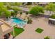 An expansive backyard boasts a private pool, spa, and meticulously manicured landscaping at 24916 N 80Th Ln, Peoria, AZ 85383