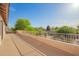 Expansive balcony overlooking trees, foliage, and neighborhood at 24916 N 80Th Ln, Peoria, AZ 85383