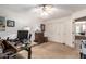 This bedroom has a ceiling fan and versatile layout, perfect for a home office at 24916 N 80Th Ln, Peoria, AZ 85383