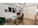 Bedroom featuring a ceiling fan, stylish lighting, neutral paint, and modern decor at 24916 N 80Th Ln, Peoria, AZ 85383