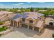 Beautiful two-story home with a tile roof, desert landscaping, and solar panels at 24916 N 80Th Ln, Peoria, AZ 85383