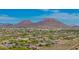 Scenic view showcasing the neighborhood with a mountain backdrop under a clear blue sky at 24916 N 80Th Ln, Peoria, AZ 85383