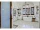 Elegant bathroom with freestanding tub, glass-enclosed shower, and custom cabinetry at 2527 E Beechnut Ct, Chandler, AZ 85249