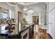 Kitchen island with seating and a built-in microwave, perfect for entertaining or casual dining at 2527 E Beechnut Ct, Chandler, AZ 85249