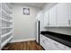 A well-organized pantry offers ample storage with custom cabinets and countertop space at 2527 E Beechnut Ct, Chandler, AZ 85249