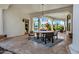 Outdoor patio with a dining table, columns, and a view of the landscape at 2527 E Beechnut Ct, Chandler, AZ 85249