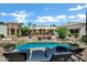 Luxury backyard with a beautiful pool, seating, and lush landscaping, ideal for entertaining at 2527 E Beechnut Ct, Chandler, AZ 85249