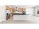 Modern kitchen with stainless steel appliances, custom cabinetry, and sleek countertops at 26139 S 225Th Way, Queen Creek, AZ 85142