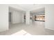 Bright and airy living room connects to kitchen and features sliding doors to the backyard at 26139 S 225Th Way, Queen Creek, AZ 85142