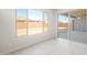 Living room with lots of natural light and sliding glass door leading to the backyard at 26139 S 225Th Way, Queen Creek, AZ 85142