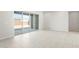 Spacious living area with sliding glass doors that open to the backyard at 26139 S 225Th Way, Queen Creek, AZ 85142
