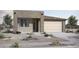 Charming single-story home featuring desert landscaping and a neutral color scheme at 26646 S 230Th St, Queen Creek, AZ 85142