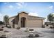 Charming single-story home featuring desert landscaping, neutral stucco exterior, and attached two-car garage at 26718 S 230Th St, Queen Creek, AZ 85142