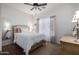 Bedroom with a large window offering natural light, neutral colored carpet and nice decor at 2685 N 132Nd Dr, Goodyear, AZ 85395