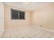 Bedroom featuring tile flooring, neutral paint, and natural light at 3013 W Port Au Prince Ln, Phoenix, AZ 85053