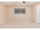 Bedroom featuring tile flooring, neutral paint, and a window for natural light at 3013 W Port Au Prince Ln, Phoenix, AZ 85053