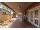 Inviting covered patio with outdoor seating and access to the yard, perfect for relaxation and entertaining at 3013 W Port Au Prince Ln, Phoenix, AZ 85053