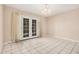 Dining room with tile flooring and natural light filtering in through French doors at 3013 W Port Au Prince Ln, Phoenix, AZ 85053