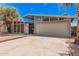 Inviting home showcases a well-maintained exterior with a spacious driveway at 3013 W Port Au Prince Ln, Phoenix, AZ 85053