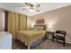 Cozy bedroom with neutral walls, carpet, and queen size bed at 3021 S Evergreen Rd, Tempe, AZ 85282