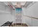 Walk-in closet with shelving and a rack for storage at 3021 S Evergreen Rd, Tempe, AZ 85282
