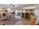 Open floor plan with a living room, dining area, and kitchen at 3021 S Evergreen Rd, Tempe, AZ 85282