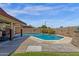 Backyard pool with concrete perimeter and partial view of lush green lawn at 3021 S Evergreen Rd, Tempe, AZ 85282