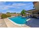 Backyard pool with a covered patio, perfect for outdoor relaxation and entertainment at 3021 S Evergreen Rd, Tempe, AZ 85282