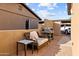 Backyard patio with an outdoor grill, seating, and easy access to parking at 3233 N 37Th St # 5, Phoenix, AZ 85018