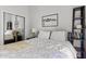 Cozy bedroom featuring a bed, closet, and modern decor at 3233 N 37Th St # 5, Phoenix, AZ 85018