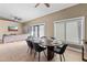 Dining area featuring sliding doors, a TV, and contemporary finishes at 3233 N 37Th St # 5, Phoenix, AZ 85018