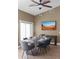 Comfortable dining room with stylish furniture, a TV, and a window at 3233 N 37Th St # 5, Phoenix, AZ 85018