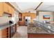 Spacious kitchen with granite countertops, wooden cabinets and stainless steel appliances at 3233 N 37Th St # 5, Phoenix, AZ 85018