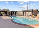 Community pool with covered seating and poolside lounges at 3233 N 37Th St # 5, Phoenix, AZ 85018