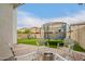 Entertainer's backyard with a fire pit, artificial grass, playground, and trampoline at 3308 E Jasper Dr, Gilbert, AZ 85296