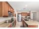 Well-equipped kitchen featuring granite countertops, stainless steel appliances, and ample cabinet space at 3308 E Jasper Dr, Gilbert, AZ 85296