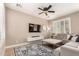 Comfortable living room featuring neutral tones, recessed lighting and a large sectional sofa at 3308 E Jasper Dr, Gilbert, AZ 85296