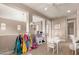 Open playroom area with dress-up station and toy kitchen perfect for entertainment at 3308 E Jasper Dr, Gilbert, AZ 85296