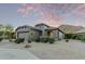 Inviting home with neutral paint, low-maintenance desert landscaping, and a mountain view at 343 W Twin Peaks Pkwy, San Tan Valley, AZ 85143