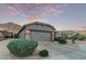Beautiful single-story home with a two-car garage and low-maintenance desert landscaping at 343 W Twin Peaks Pkwy, San Tan Valley, AZ 85143