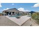 Large backyard with a refreshing pool, lounge chairs, and ample space at 3515 N Brooklyn Dr, Buckeye, AZ 85396