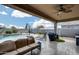 Outdoor covered patio with a view of the backyard and pool at 3515 N Brooklyn Dr, Buckeye, AZ 85396