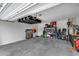 Spacious garage with epoxy flooring, storage shelving, and organizational system for storage at 3515 N Brooklyn Dr, Buckeye, AZ 85396